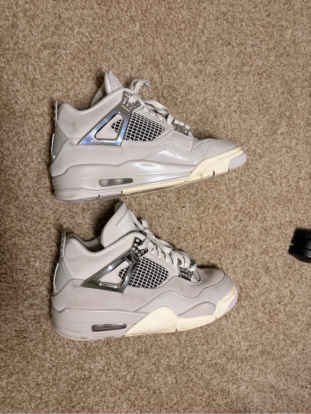 Woman Air Jordan 4 Retro 'Frozen Moments'